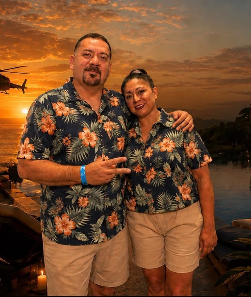 Jaime Ochoa with a guest at sunset, poolside at an oceanfront resort